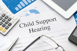 Child support hearing form on a desk.